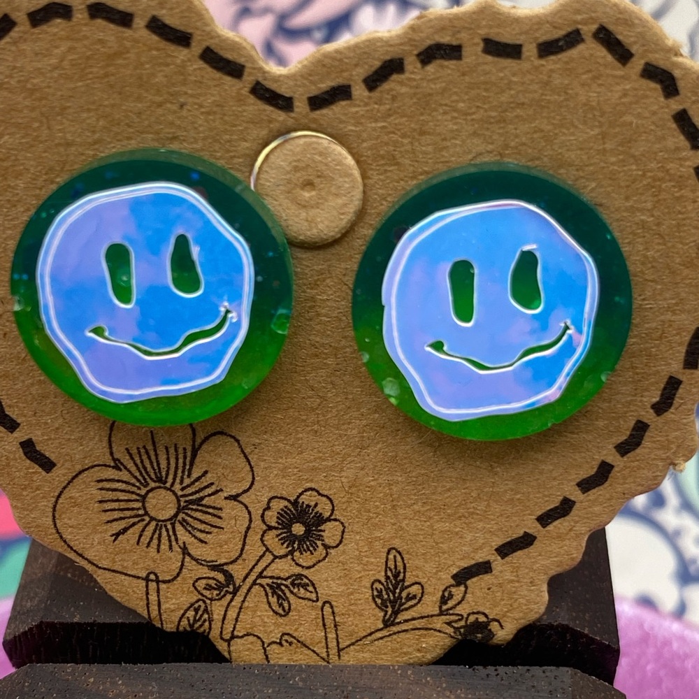 3 for $12 - Blacklight Reactive Glow Melty Smiley Face Earrings